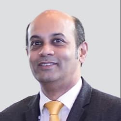 Dr. Alaric Aroojis
