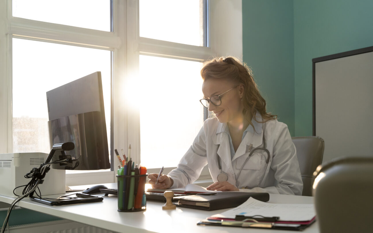 Indian doctor pursuing an online dermatology course while working, with flexible and self-paced learning.