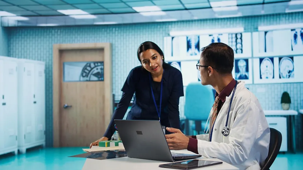 Doctor discussing a psychiatry career pathway with a young medical student in India